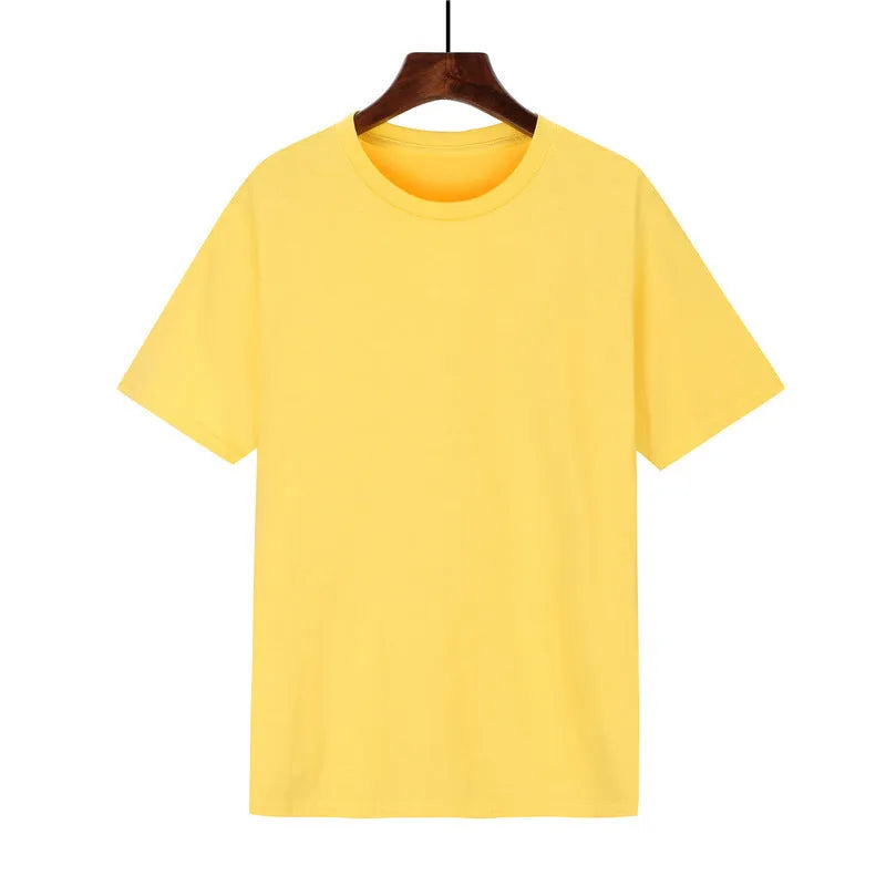 Men's loose-fit cotton t-shirt in black, shown on a model, with short sleeves.