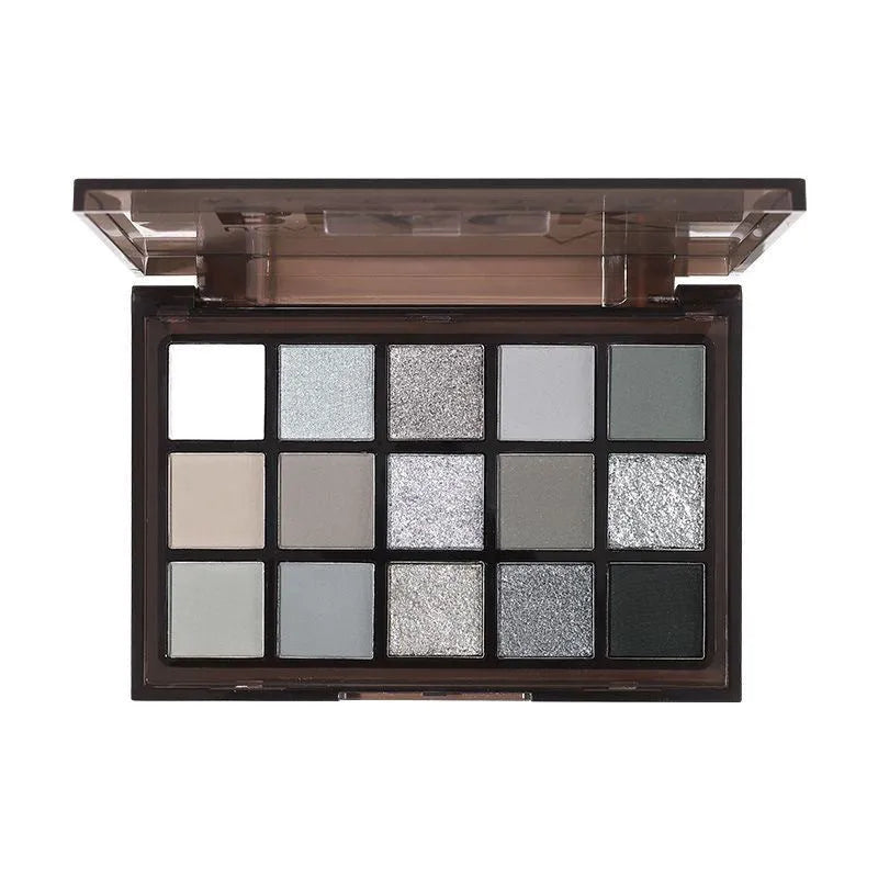 Matte eyeshadow palette showing fifteen colours in brown and blue shades with shimmer finishes