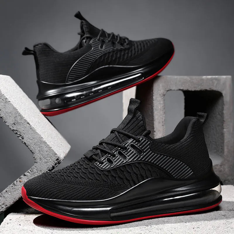 Men's low-top black mesh running shoes with lace-up front and rubber sole.
