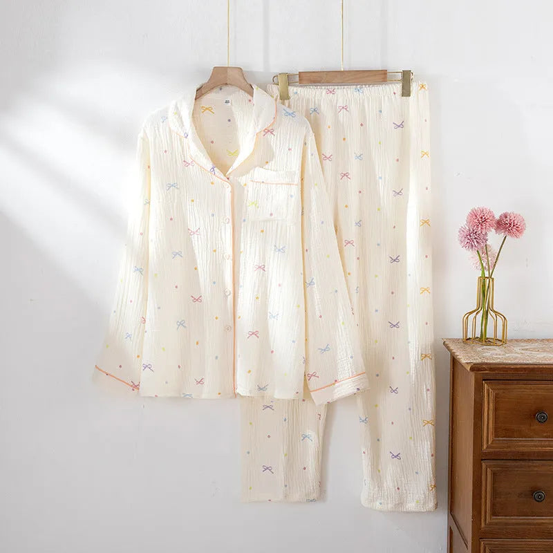 Women's cotton pajama set with long sleeves in lightweight crepe fabric, shown in pink colour