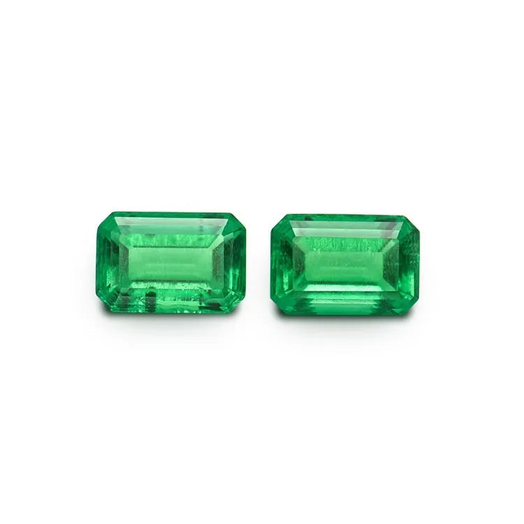 Synthetic emerald gemstone beads in Columbia green treasure colour showing round and rectangular cut options
