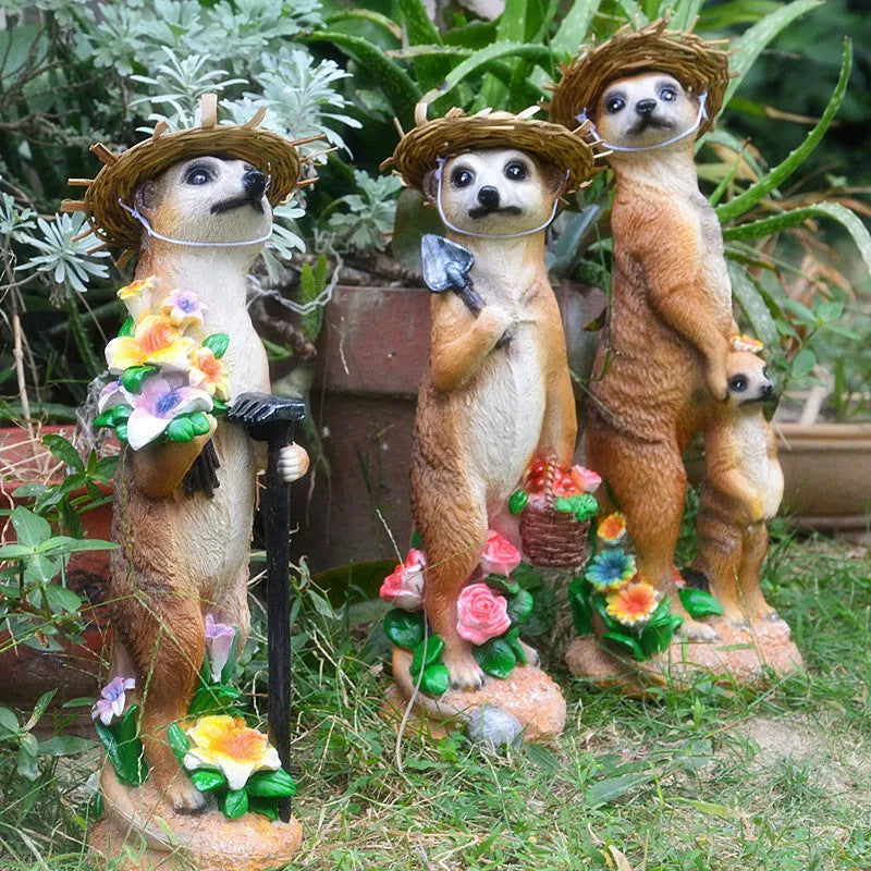Straw hat mongoose ornament set with gardening tools in yellow brown and straw colour variations
