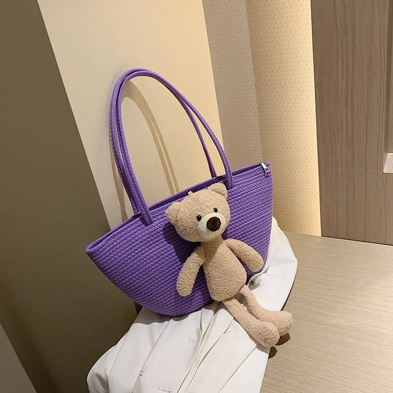 Cotton and linen woven bag with dumpling shape, double shoulder straps, and three-dimensional pocket