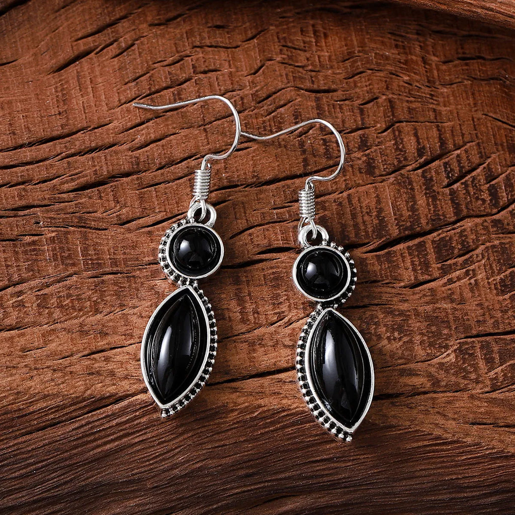 Geometric vintage pendant earrings with black and purple electroplated finish and round elements