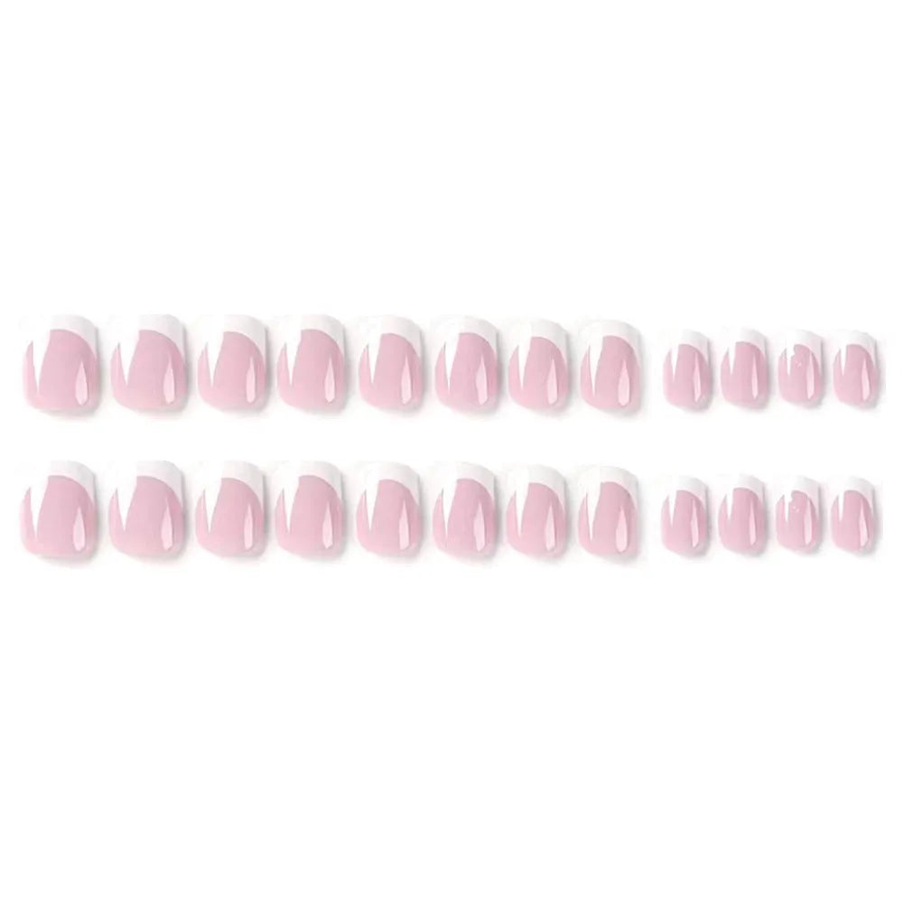 24 white square fake nails with a black and white plaid pattern, laid out on a surface.