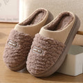 Men's grey and brown plaid rabbit hair slippers with thick EVA sole and wool lining.