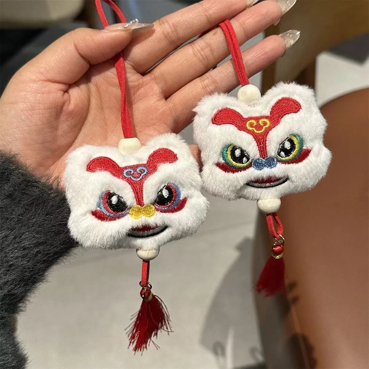Blue and yellow Chinese style plush lion keychain ornament with star stone decorative elements