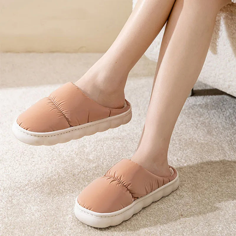 Down cotton indoor slippers with artificial leather upper and rubber sole in various colours