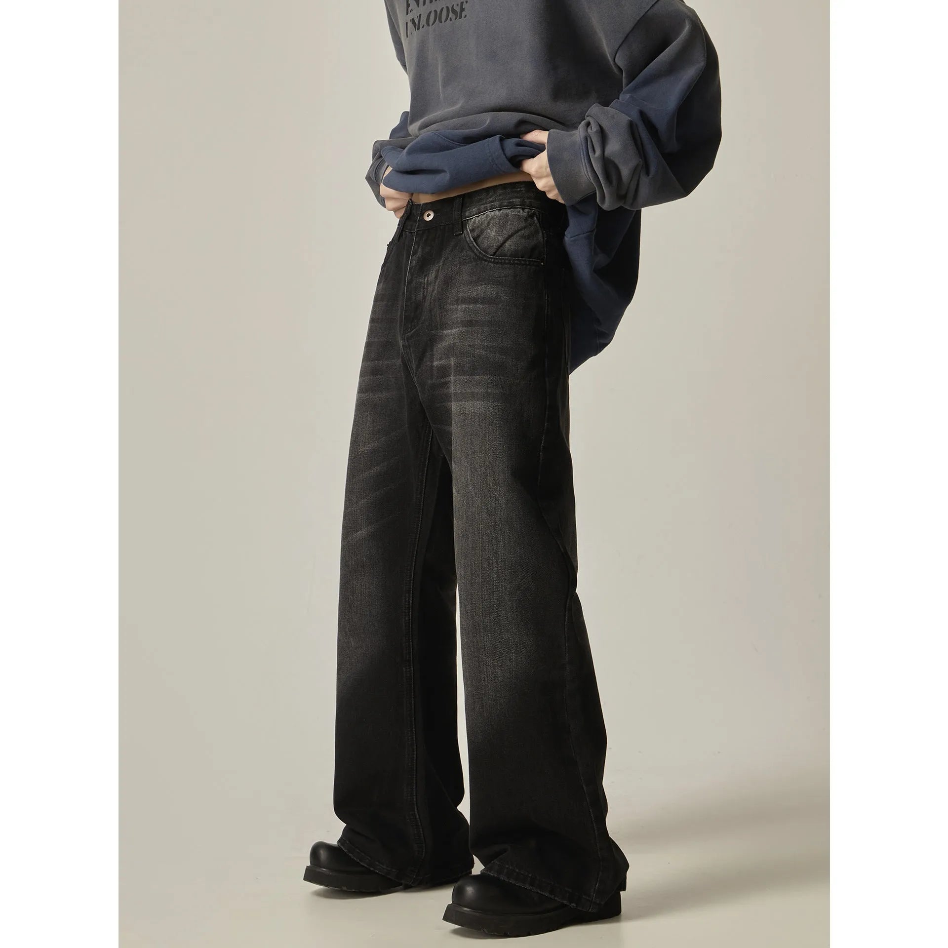 Black American retro straight-leg jeans with loose fit and zipper fly closure