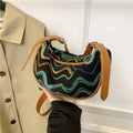 Women's knitted straw woven crossbody bag with internal compartments in corrugated brown colour
