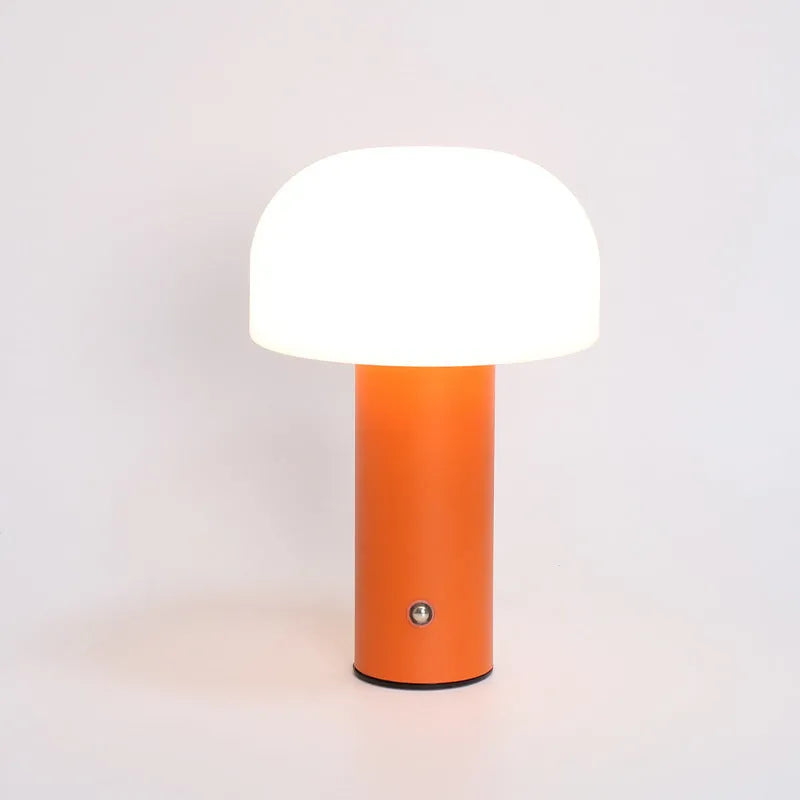 USB-powered dual-purpose table lamp providing atmospheric lighting and charging in black, green, orange, or white