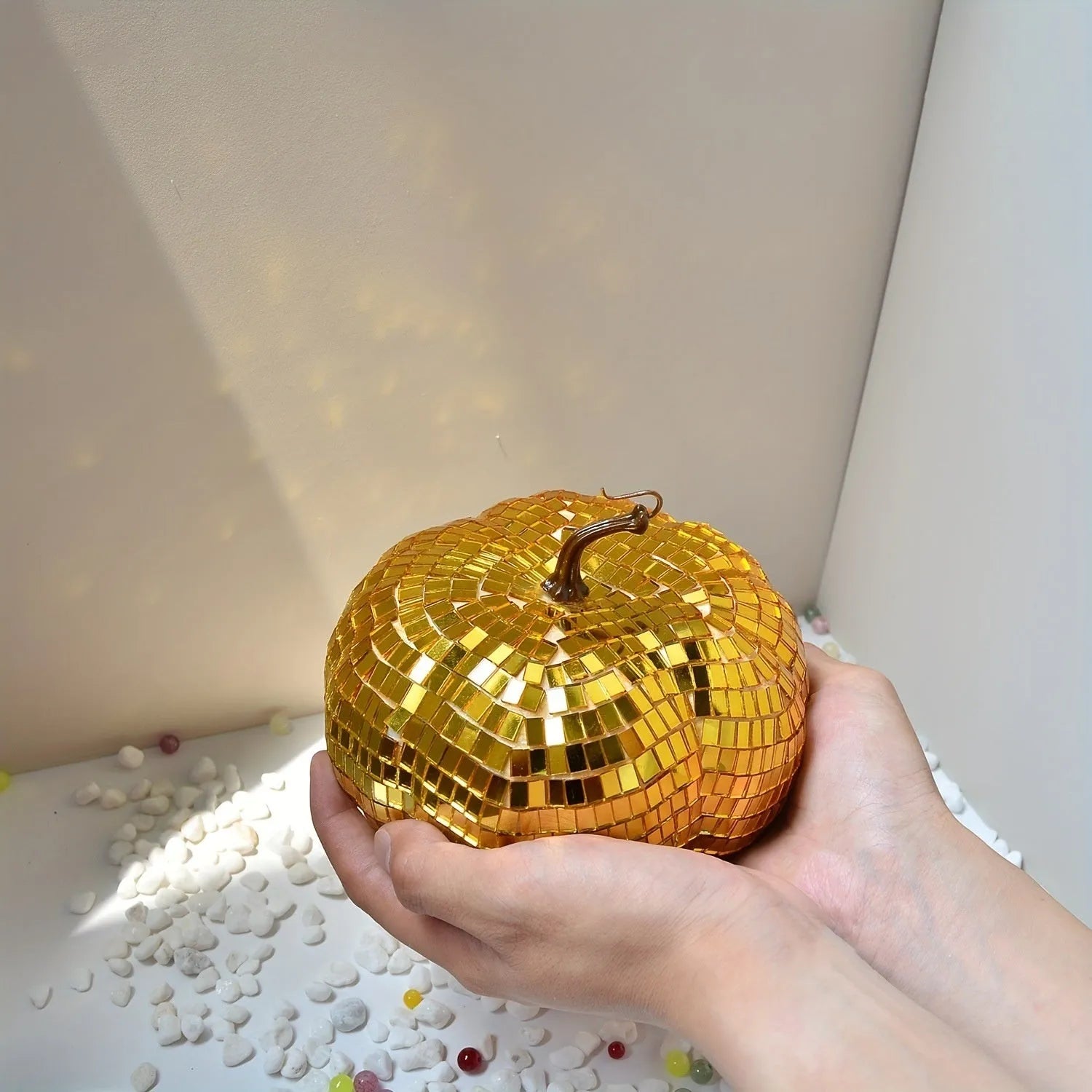 Glass pumpkin Halloween decoration in Chinese style, showing textured embroidered surface