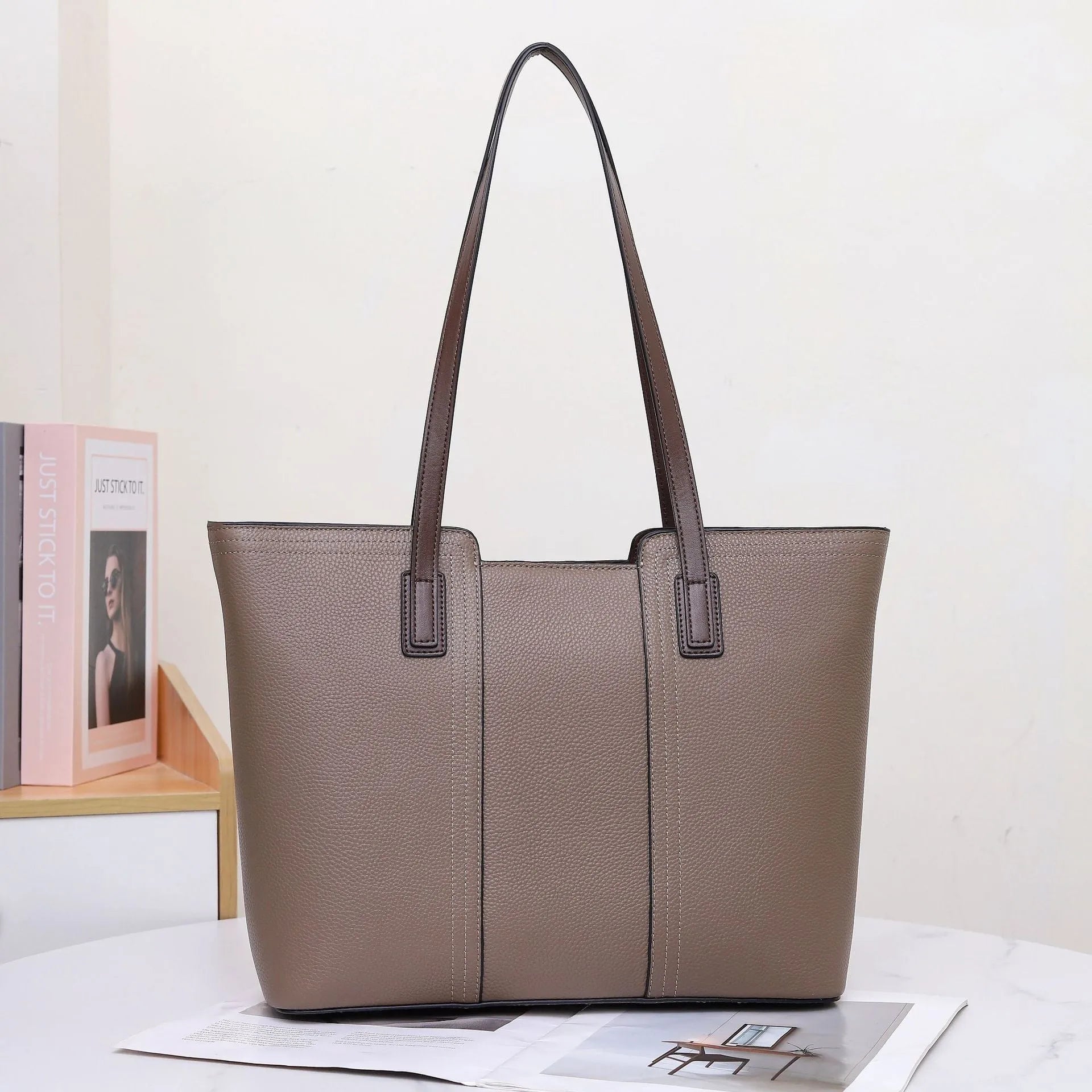 Women's genuine leather shoulder bag in box-type design with mobile phone compartment, shown in multiple colour options