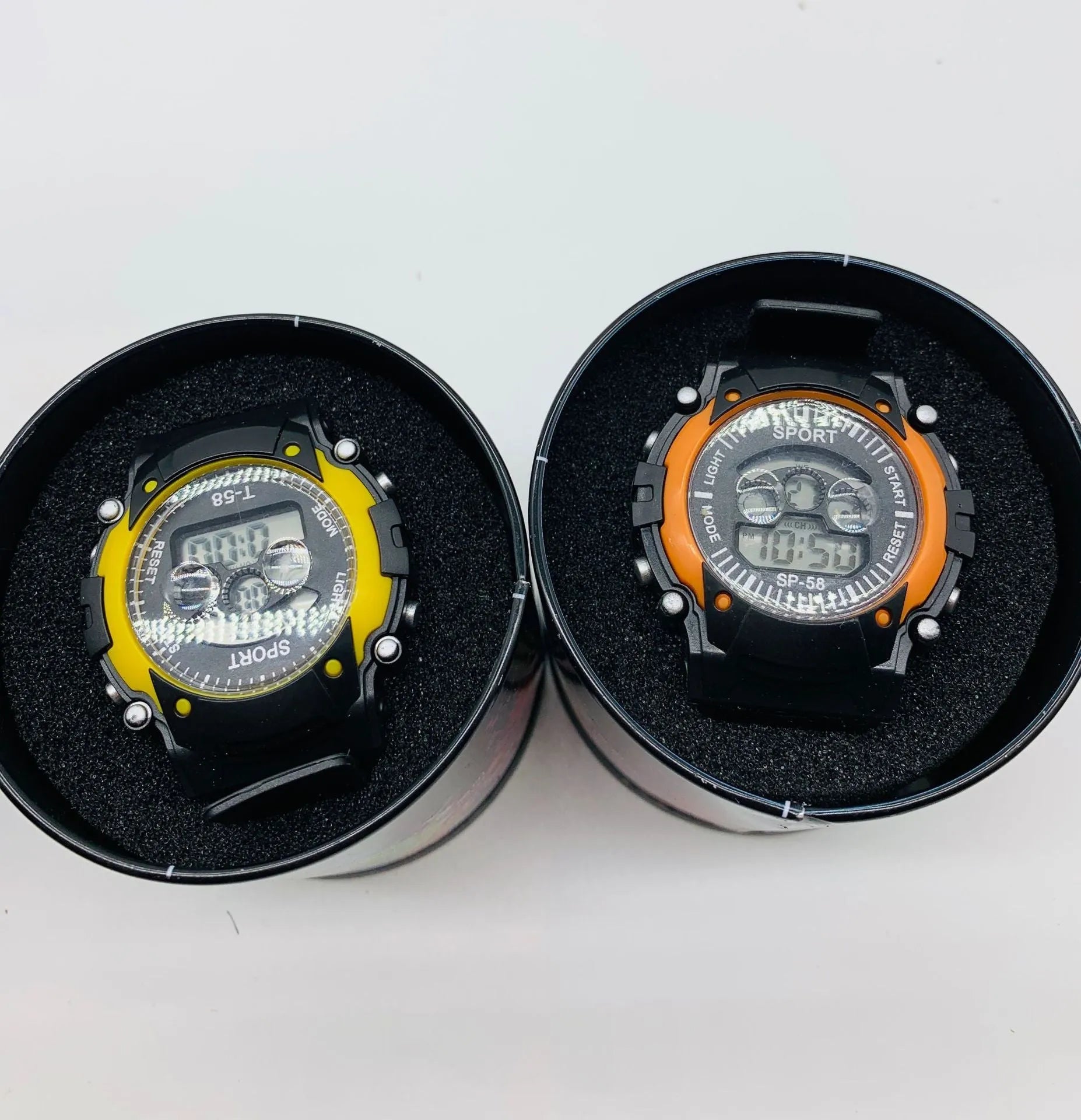 Children's digital sports watch with black silicone strap and digital display showing time
