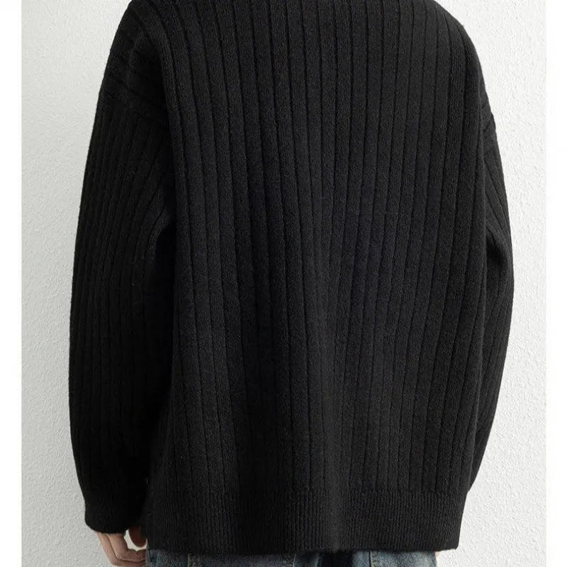 Men's grey loose fit half zip pullover sweater with textured knit and long sleeves
