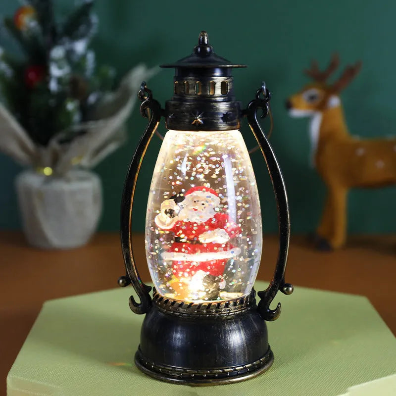 Crystal ball LED Christmas ornament showing snowman and elderly oil lamp design variations