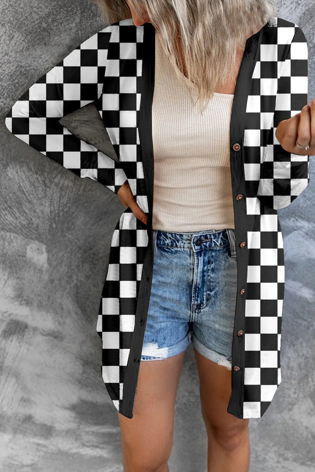 Women's long grey plaid knitted cardigan coat with regular sleeves on a hanger