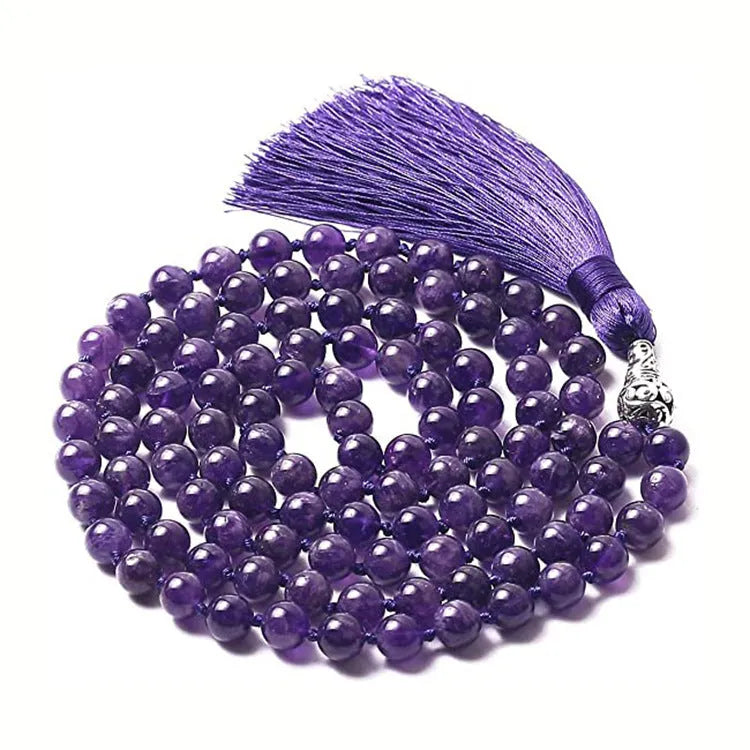 Long multicoloured agate and gemstone tassel necklace with geometric beads.