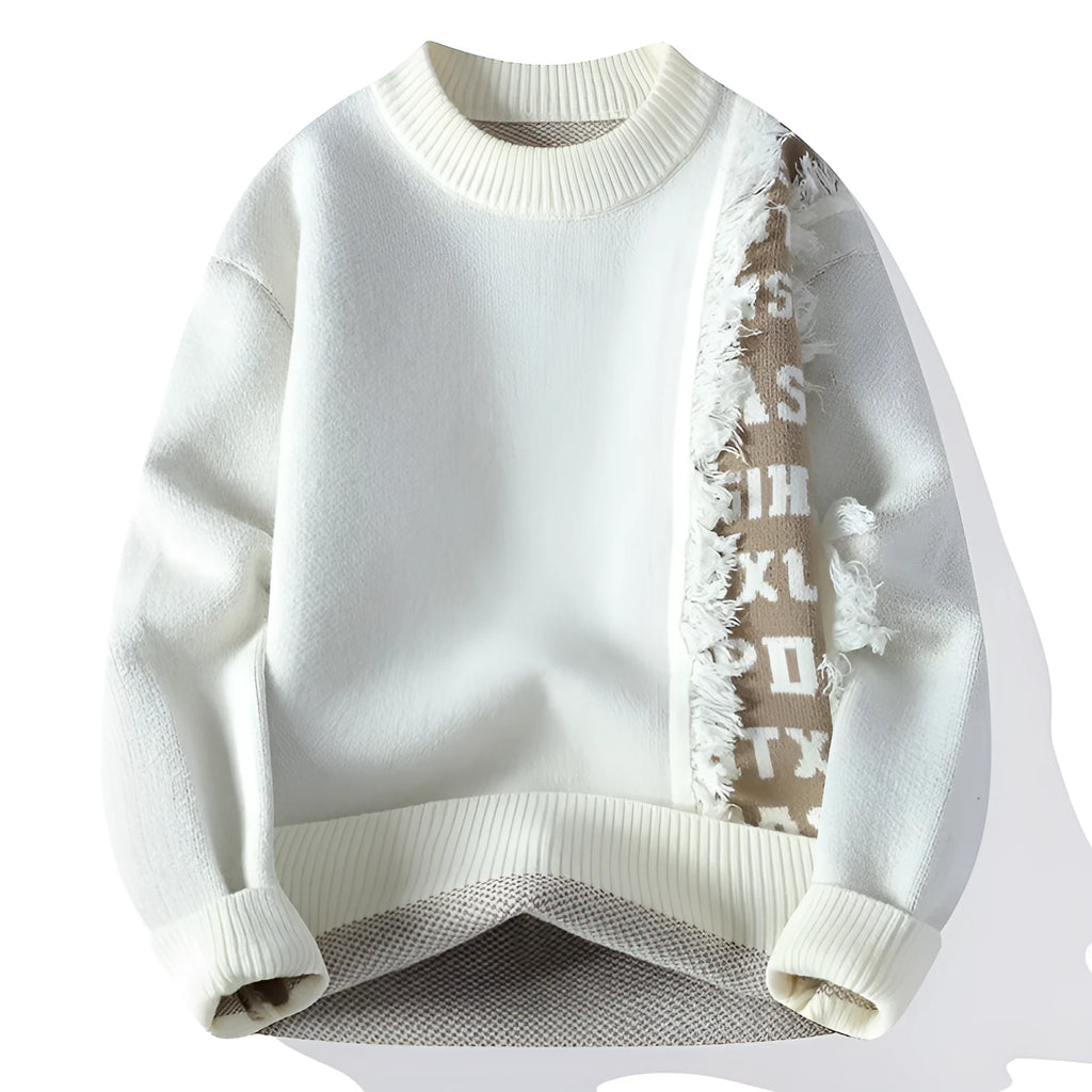 Man wearing a loose fit grey knitted pullover with ribbed hemline