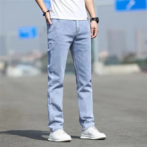 Men's smoky gray straight leg jeans with low waist and zip fly made from elastic rabbit fur fabric