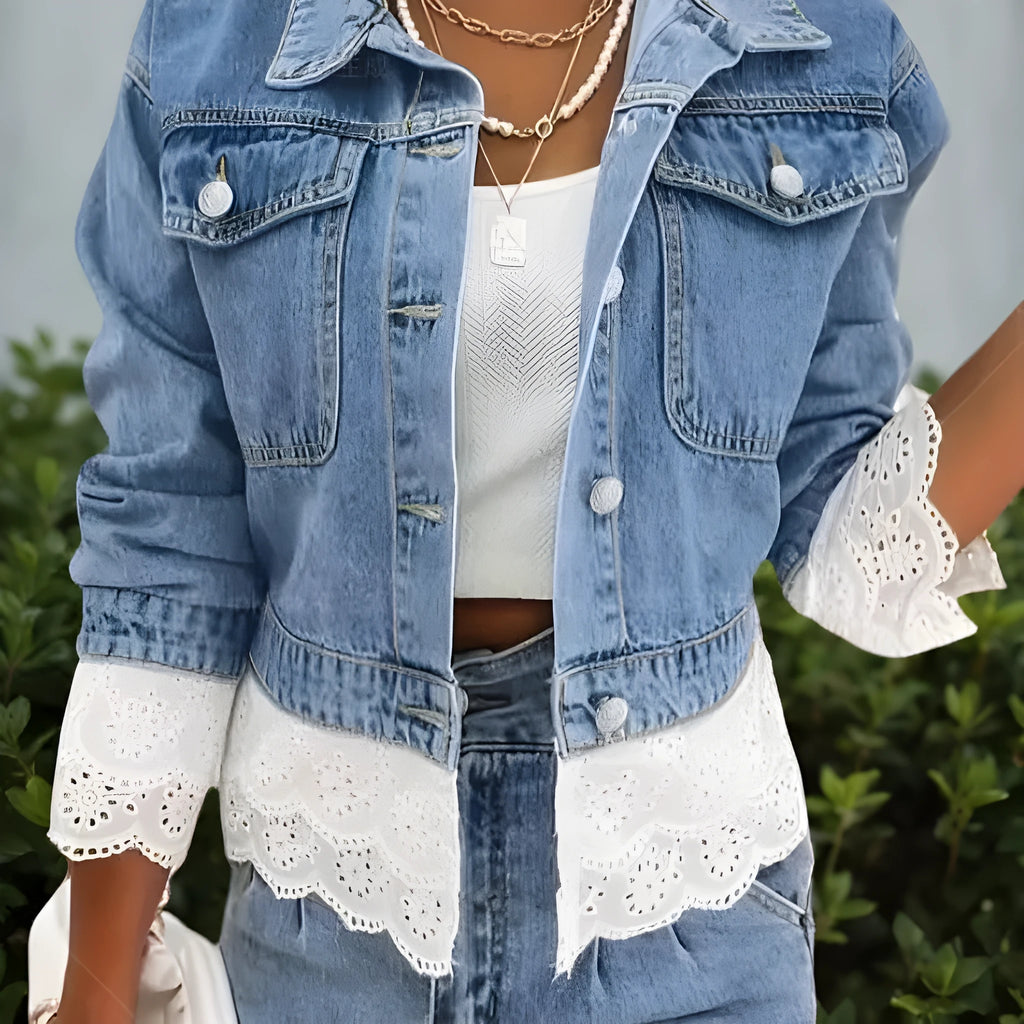 Blue women's denim jacket with lace stitching detail on the front.