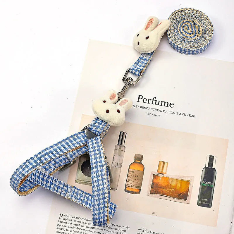 Small dog harness with leash in blue colour showing quick-release buckles and adjustable nylon straps