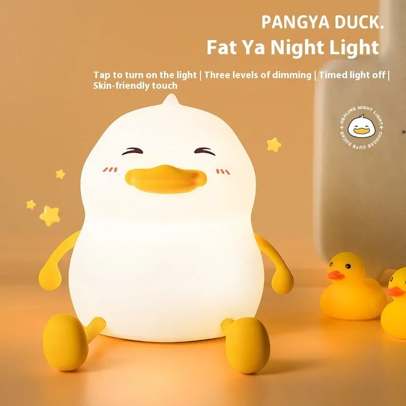 Chubby night light desk lamp with silicone phone holder in soft glow