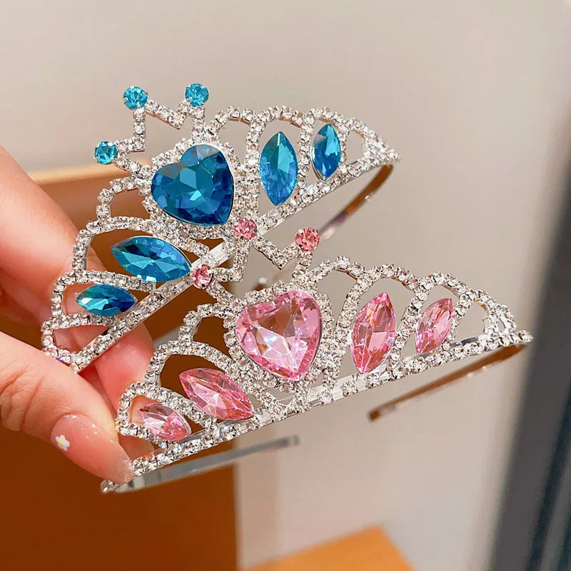 Children's metal alloy crown headdress hairband in pink, light blue, or light purple with crystal decoration.
