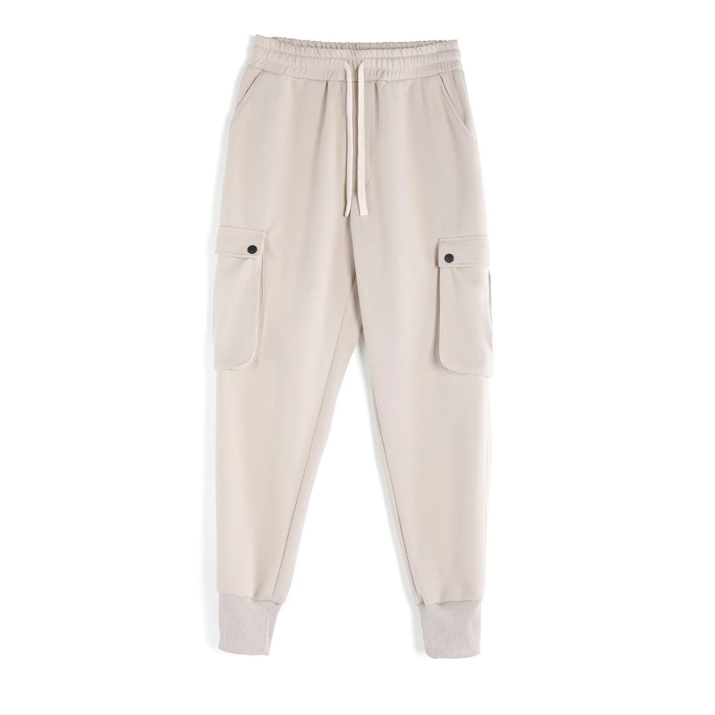 Men's loose light gray cotton trousers with ankle-tied cuffs and multiple pockets