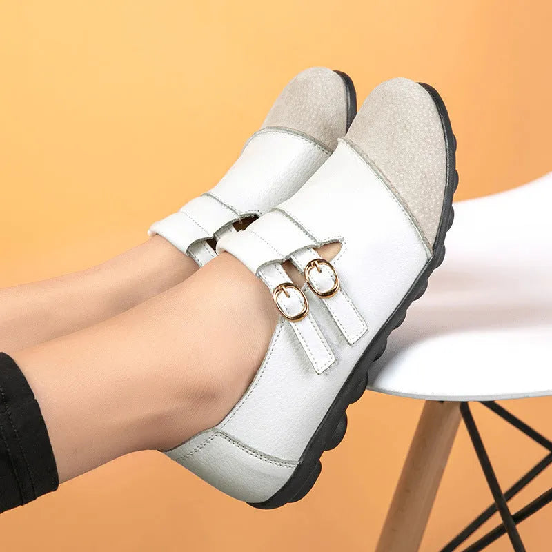 Women's casual round-toe flat shoes with a black Velcro strap on a cow leather upper.
