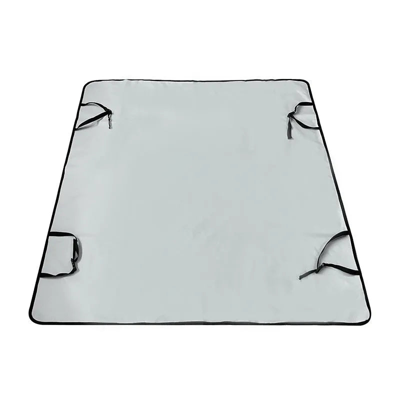 Dog car seat protector mat on rear bench seats in grey dog footprints pattern