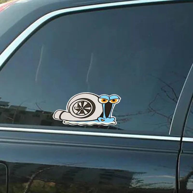 Cartoon snail reflective car sticker decal measuring 12 by 8 centimetres.