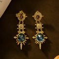 Gold colour retro geometric stud earrings with round design elements on alloy material