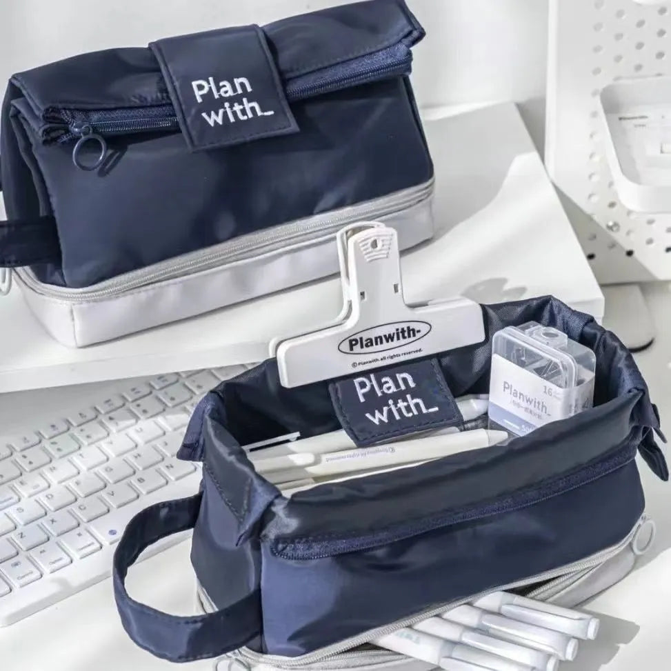 Folding double-layer polyester pencil case in dark blue, blue, and cream white colour options
