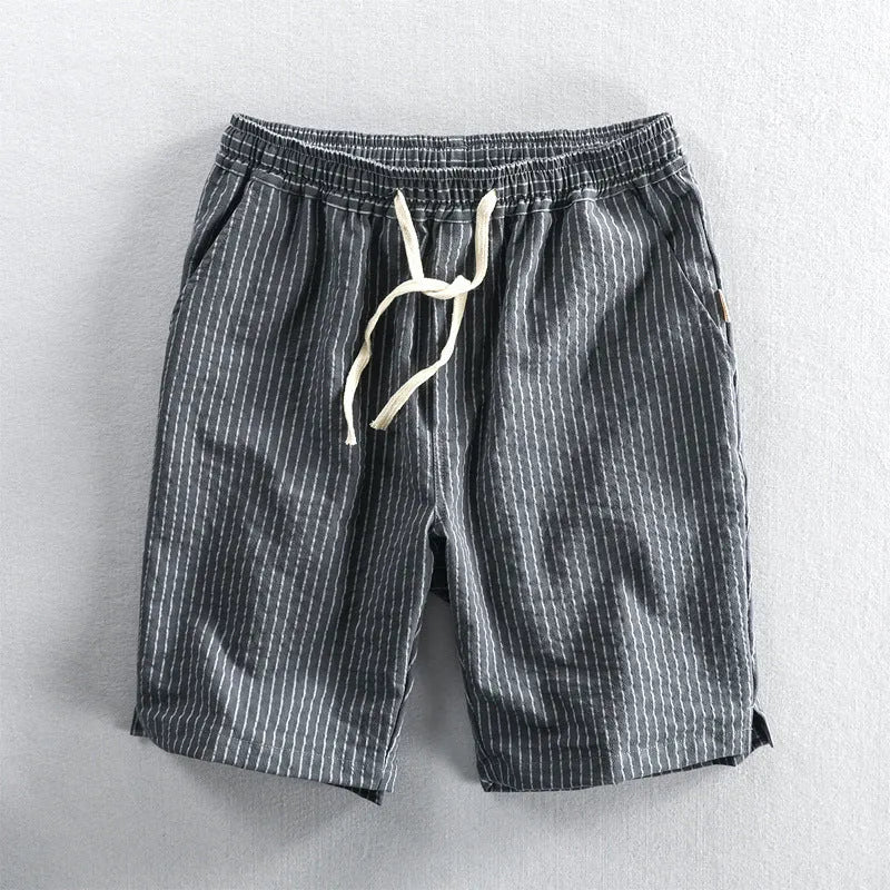 Men's striped casual shorts in loose straight-leg fit with elastic waistband.