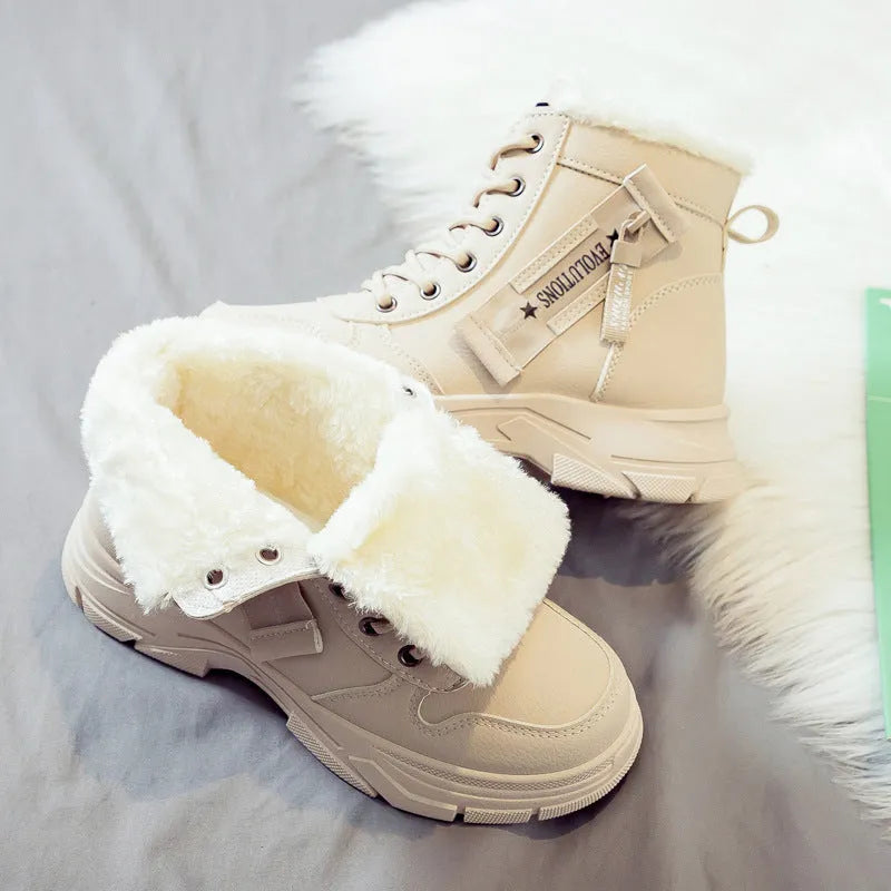 Women's plus size tall black snow boot with velvet lining and lace-up front on a rubber sole.