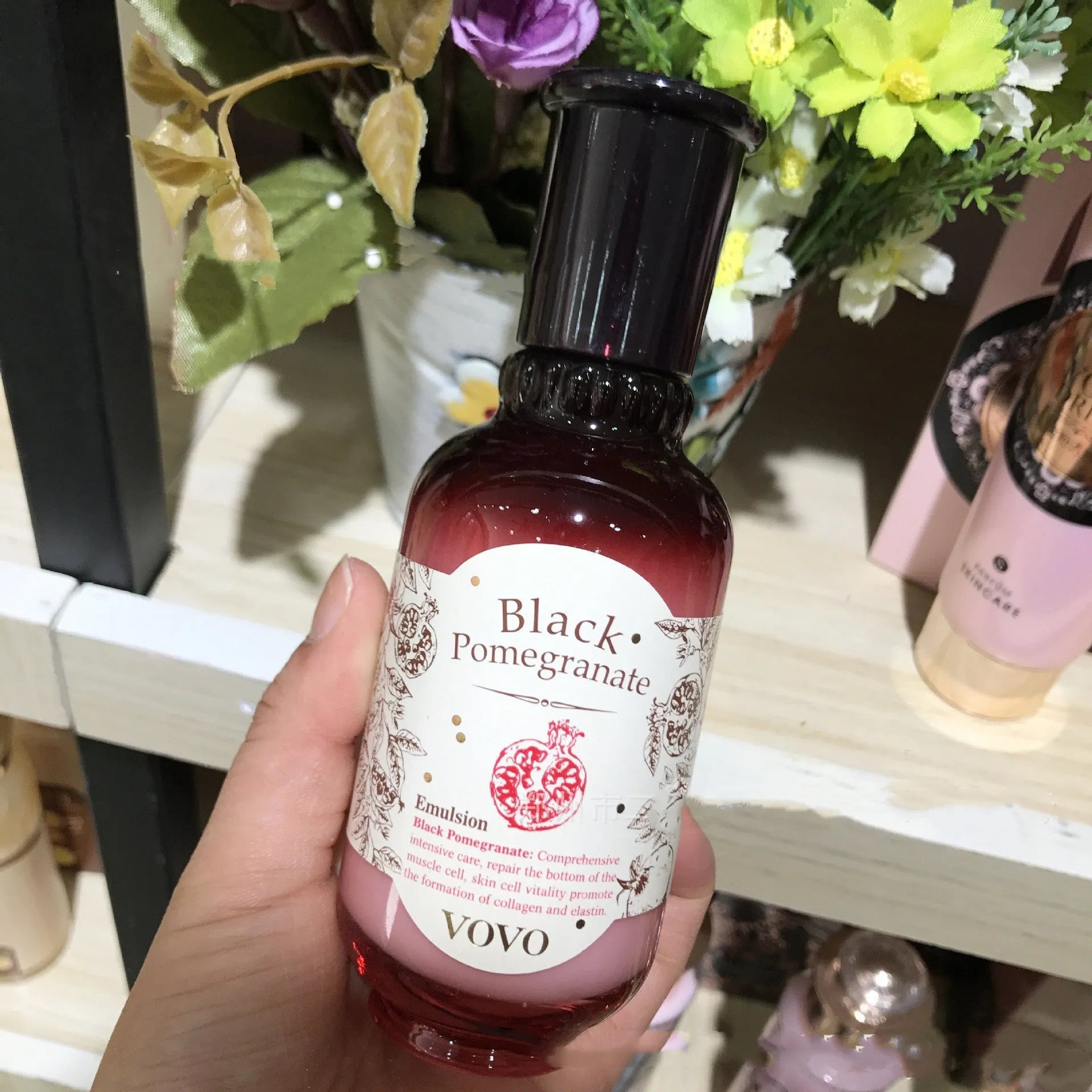 Pomegranate skincare set showing six products: cleanser, water, milk, cream, essence and eye cream