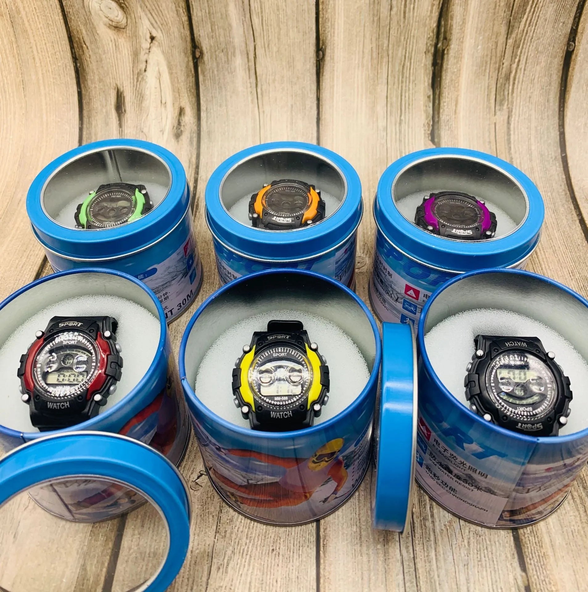 Children's digital sports watch with black silicone strap and digital display showing time
