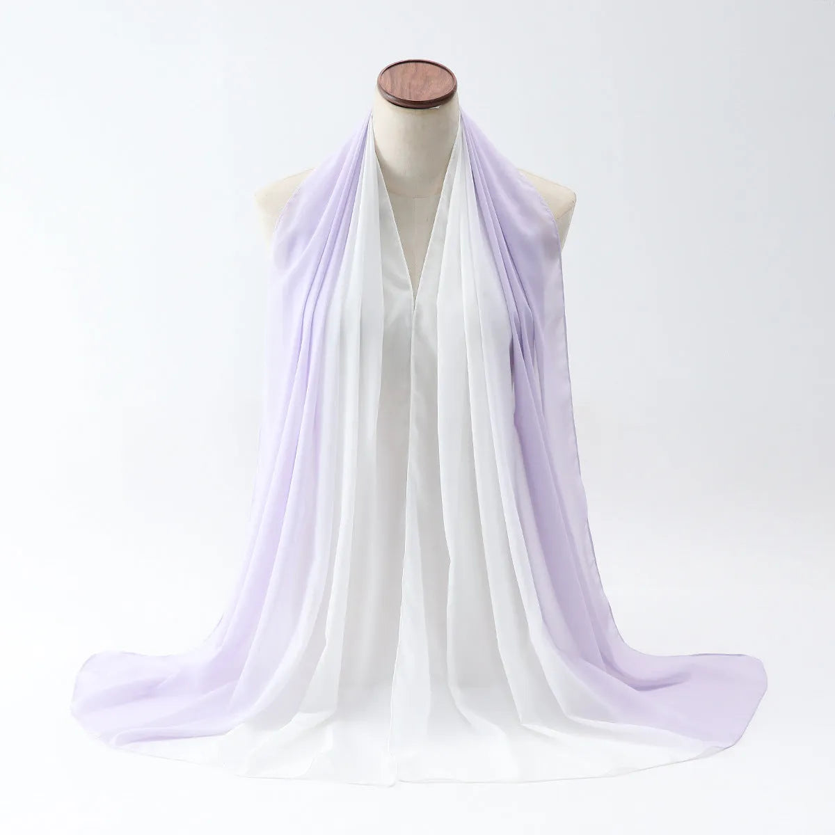 Long polyester chiffon summer scarf for women in an ethnic style, shown in one of twelve available colours.