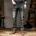 Men's skinny jeans in retro colour with zip fly, showing stretch denim fabric and slim pencil pants cut