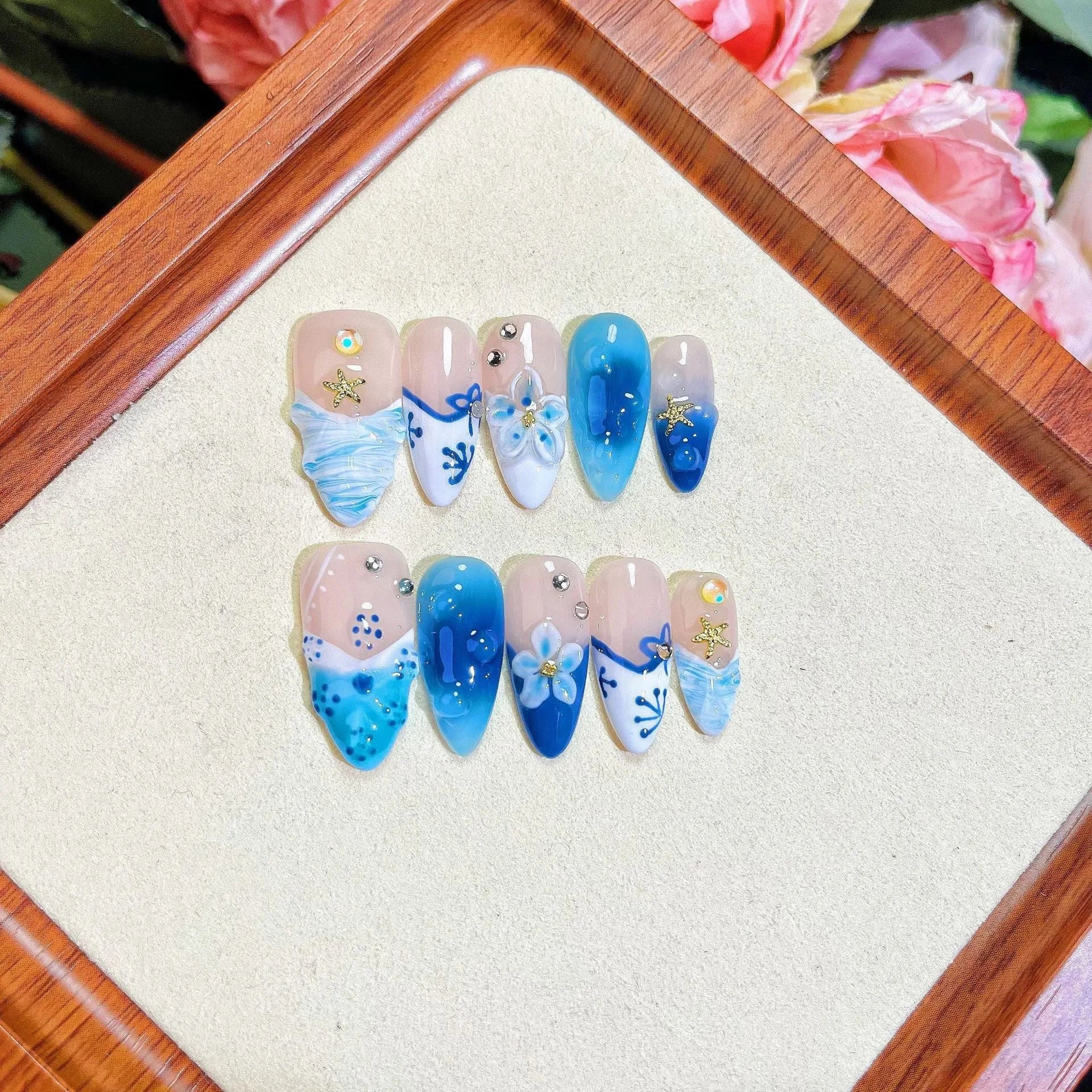 Blue hand-painted carved summer ice transparent plastic fake nails set in sizes XS S M L