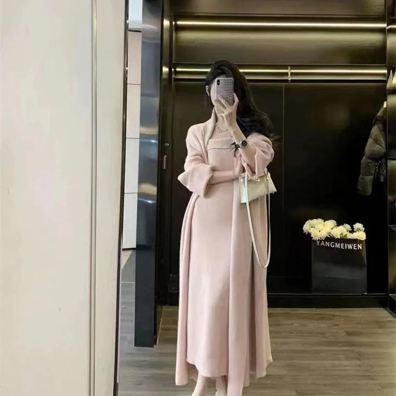 Women's grey knitted cardigan dress suit with matching coat, showing flocked pattern detail.