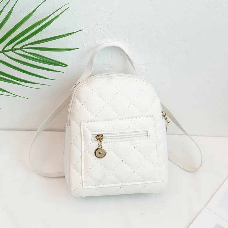 Hard shell square girls backpack with embroidery in black, pink, or white colours.