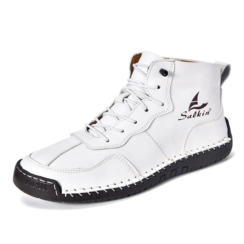 Men's beige retro high-top casual boots with elastic band and round toe on a non-slip rubber sole.