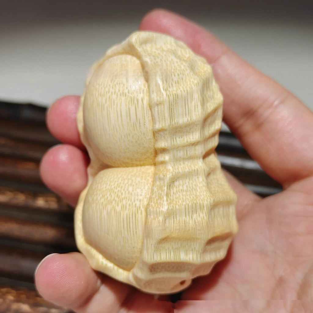 Solid bamboo peanut ornament carving with May Good Things Happen message