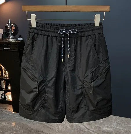 Men's camouflage cargo shorts in a loose fit with multiple pockets, shown in camouflage pattern.