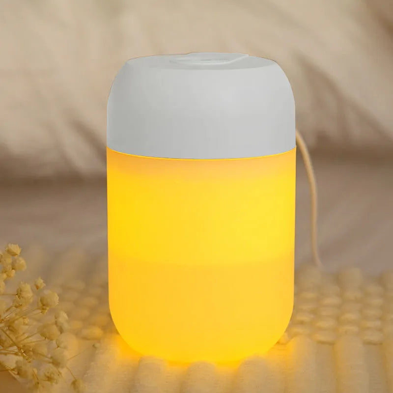 White cylindrical mini humidifier with USB port and aromatherapy function for small-space moisture control