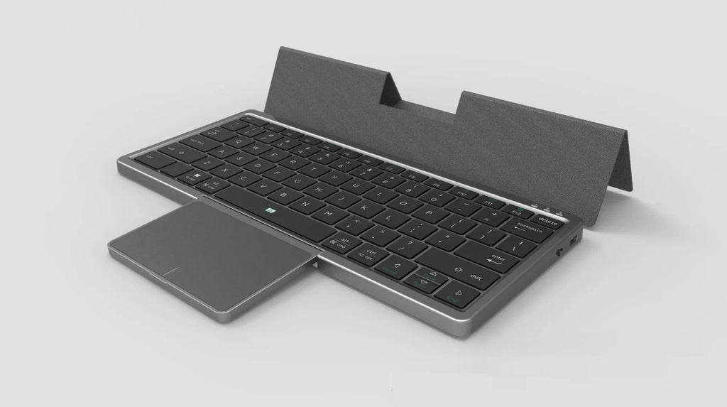 Black and grey three-in-one wireless Bluetooth keyboard with leather sheath and stand for iPad.