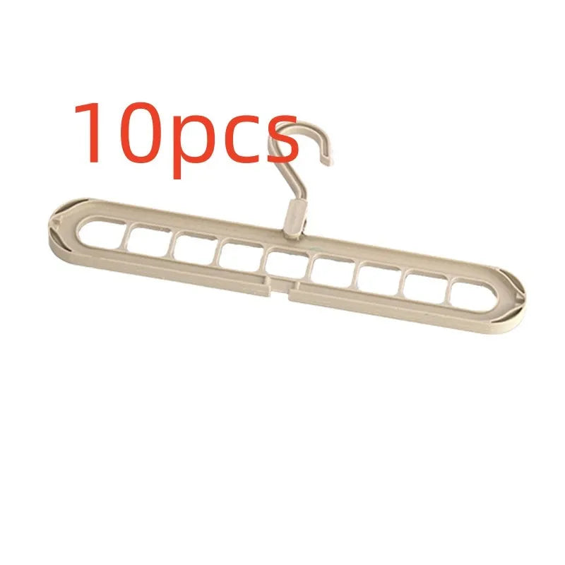 A green plastic multifunctional hanger with nine holes for trousers, shown in a folded and unfolded position.