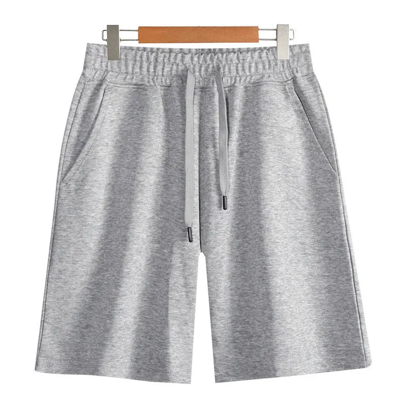 Straight leg cotton sports shorts in light grey on a neutral background.